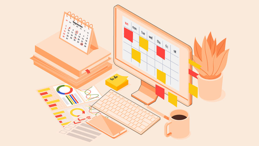A workspace with a desktop calendar, charts, sticky notes, coffee mug, smartphone, and a potted plant, all arranged for planning and productivity.