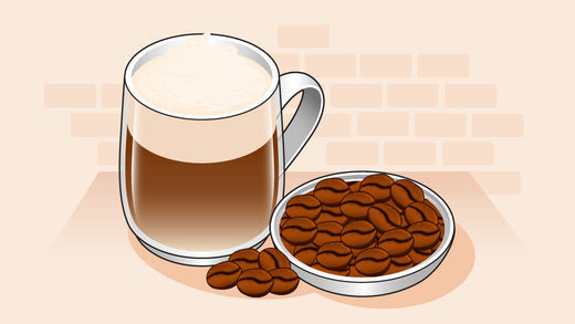 Cappuccino in a glass mug with creamy milk foam