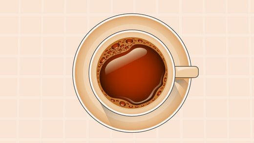 Top-down view of a beige coffee cup filled with steaming coffee
