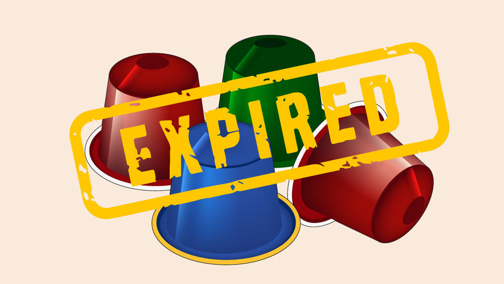 Colorful coffee pods with a yellow “EXPIRED” stamp.