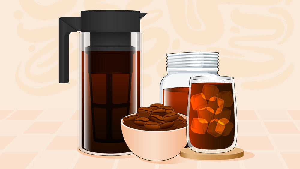 Cold brew coffee setup with a pitcher, glass of iced coffee, jar of concentrate, and bowl of coffee beans.