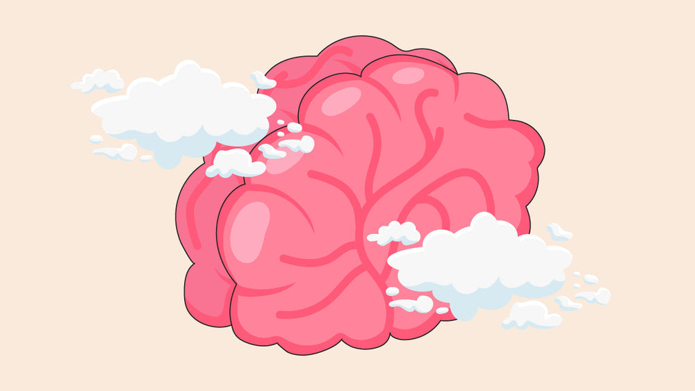 Cartoon-style pink brain surrounded by fluffy white clouds.