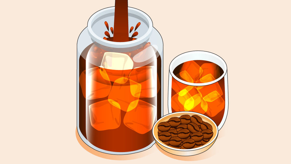 Cold brew coffee being poured into a jar with ice, next to a glass of iced coffee and a bowl of coffee beans.