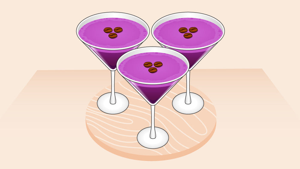 three Ube Espresso Martinis in cocktail glasses