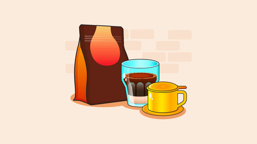 a coffee bag, a glass of freshly brewed coffee, and a yellow mug with a lid