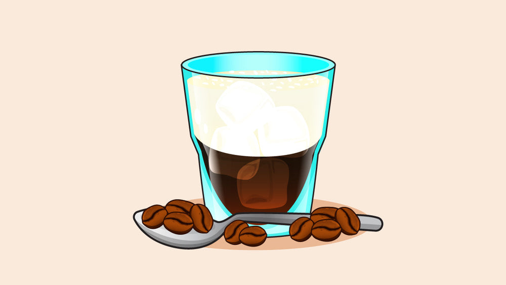 a Vietnamese iced coffee with condensed milk, ice cubes, and coffee beans on a spoon, highlighting its creamy texture