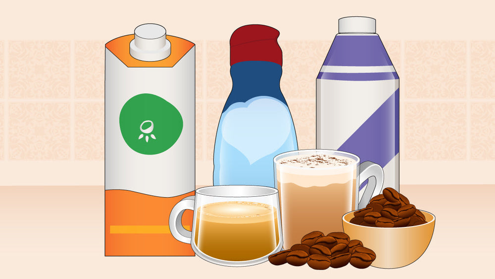 Coffee with milk beside a bowl of coffee beans and cartons of milk and creamer on a kitchen counter.