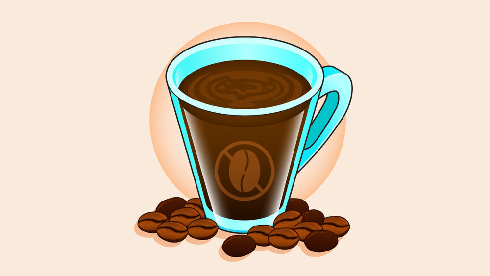 A hot, ready-to-drink decaf coffee in a transparent cup with a spoon next to it.