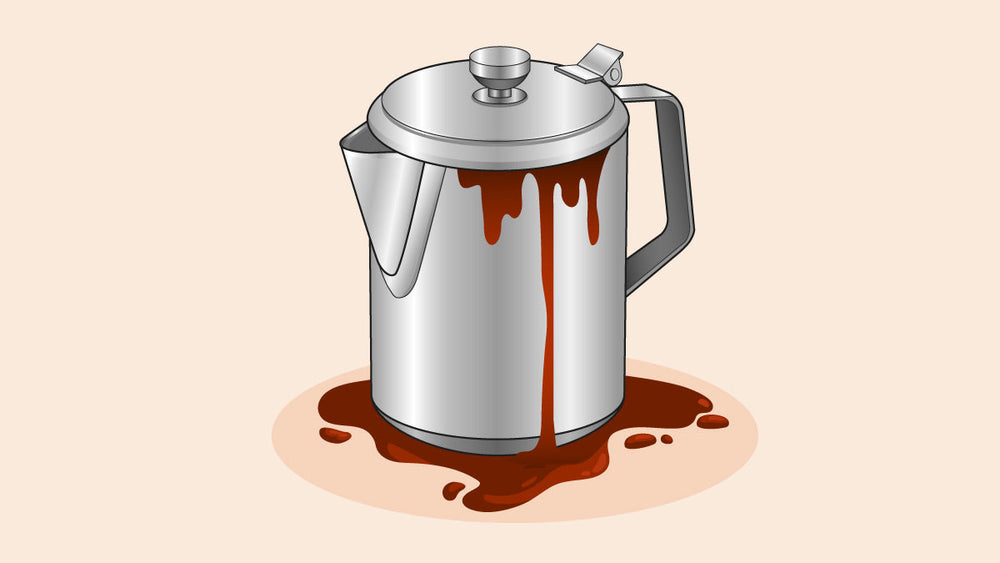 Stainless steel coffee pot with spilled coffee on the surface below