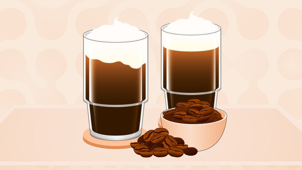 Two iced coffee drinks with cream on top, next to a bowl and pile of coffee beans.